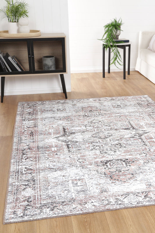 Amelie Distressed Blush Machine Washable Rug