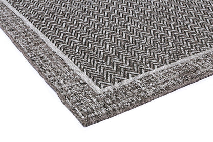 Capri Natural Boarder in Black Rug