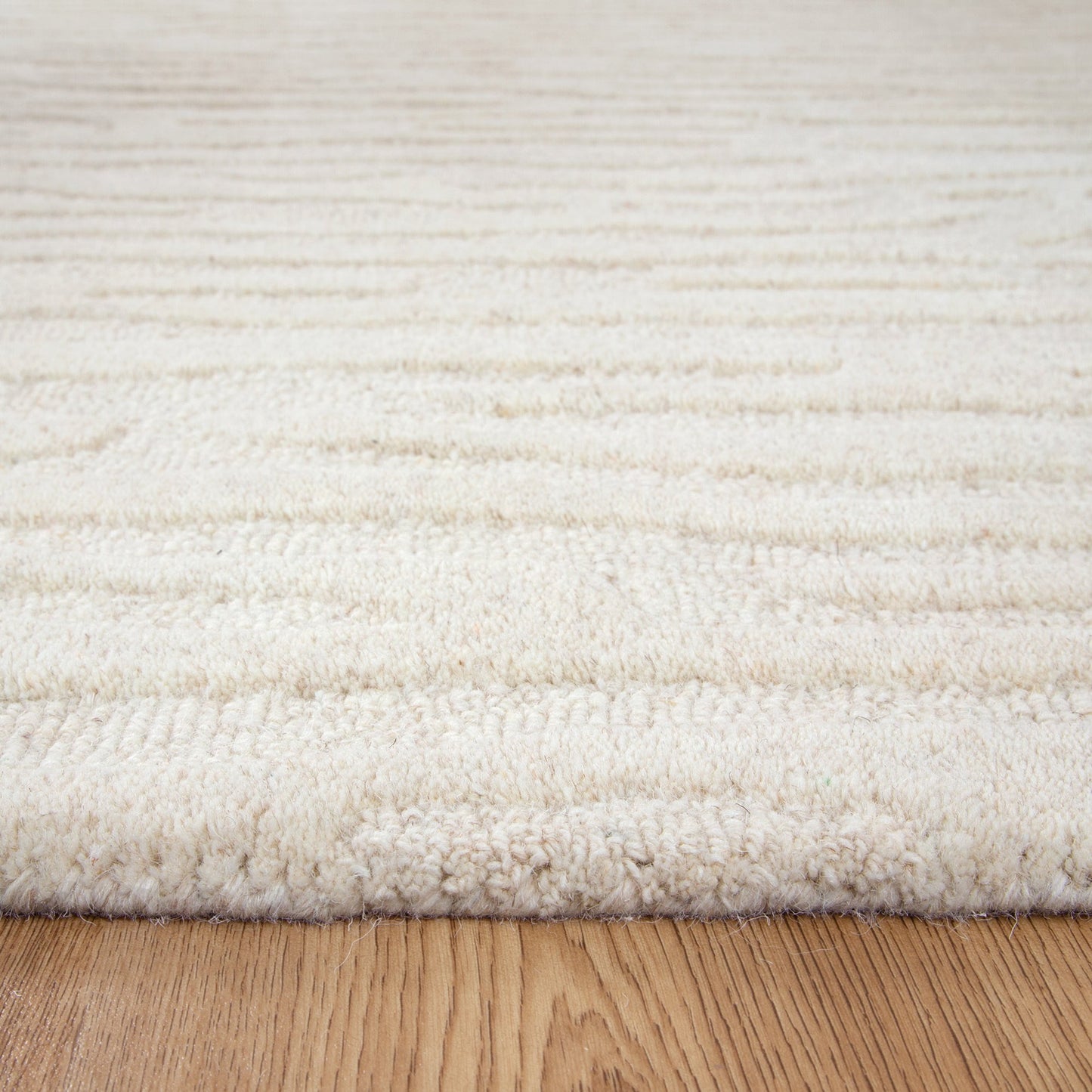 Les Nomades Sandstorm Cream Wool Rug